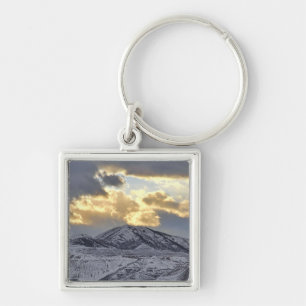 Stormy Sunset Over Snow Capped Mountains Key Ring