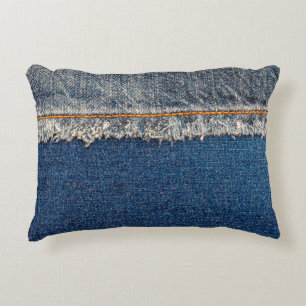 Straight stitch with orange thread on bleached den decorative cushion