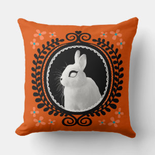 Strange White Bunny: Orange, Teal, & Black Cushion