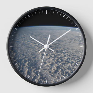 Stratocumulus Clouds Above The Pacific Ocean. Clock