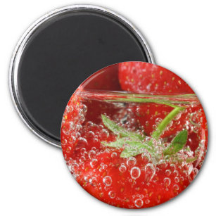 Strawberries in water close up magnet