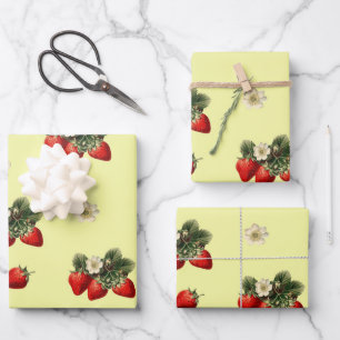 Strawberry wrapping paper with blossoms on yellow