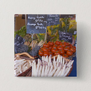 Street market merchant's stall with white 15 cm square badge