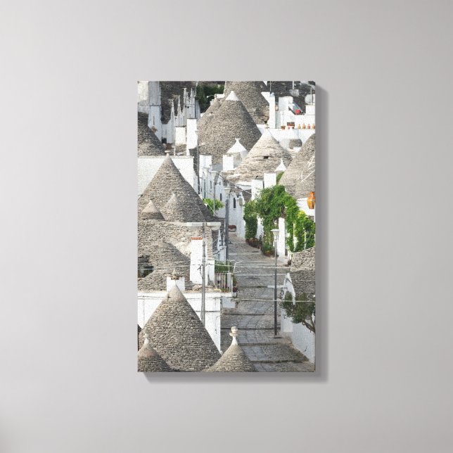 Street with trulli houses in Alberobello, Puglia Canvas Print (Front)