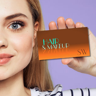 Striking Orange and Teal Mirror Font with Monogram Business Card