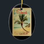 Stuart Palm Tree Vintage Travel Ceramic Tree Decoration<br><div class="desc">A uniquely retro mid-century modern Stuart Florida art print in vintage travel poster style. It features a curved palm tree on sandy beach with ocean under a blue cloudy sky.</div>