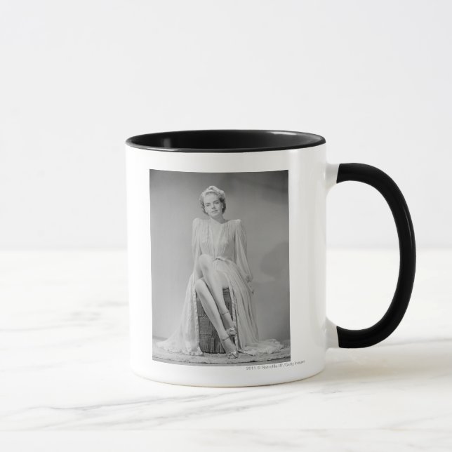 Studio portrait of young woman in nightgown mug (Right)
