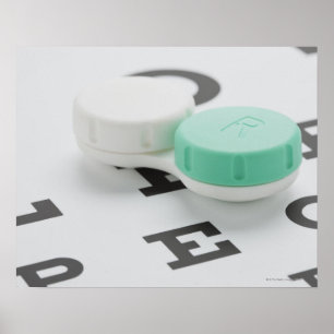 Studio shot of contact lens case on eye chart