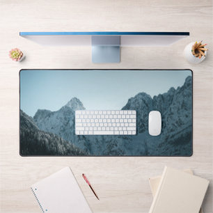 Stunning mountains and spruce forest desk mat