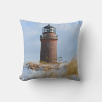 Sturdy Lighthouse on a Rocky Coast in Winter
