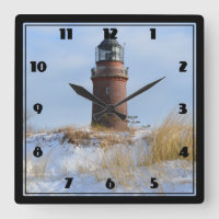 Sturdy Lighthouse on a Rocky Coast in Winter