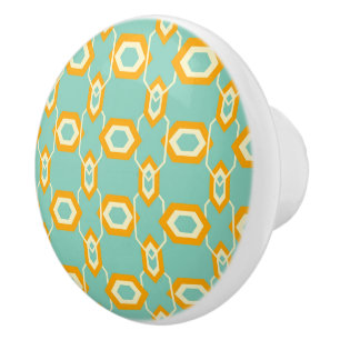 Stylised geometric pattern in bold orange hexagon ceramic knob
