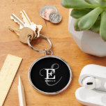 Stylish Black Calligraphy Script Monogram Name Key Ring<br><div class="desc">A beautiful key chain design with an elegant stylish representation of your name and monogram with classic serifs and a more ornate script typography in a balanced and symmetrical harmony. The three elements blend together with a sophisticated harmony and create your own personal branding logo. Shown here with a chic...</div>