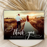 Stylish Calligraphy 2 Photo Wedding Thank You Card<br><div class="desc">Elegant Modern Chic Boho Calligraphy Wedding 2 Photo Thank You Card. Stylish Simple wedding thank you template featuring a full vertical photo on the front with the text "Thank You" in a whimsical swirly hand lettering typography script swash tail font white overlay on the picture and a reverse side one...</div>