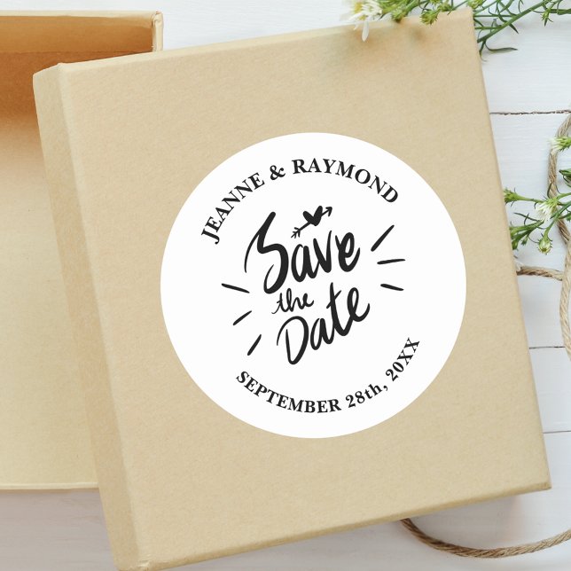 Stylish Calligraphy Wedding Save the Date Classic Round Sticker (Stylish calligraphy save the date sticker adds elegant charm to wedding invitations.)