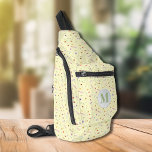 Stylish Delicate Wildflowers Yellow Sling Bag<br><div class="desc">This stylish sling bag features an all-over pattern of dainty wildflowers on a yellow background and your monogram initial on the front. Three zippered compartments can easily store your keys, wallet, phone, camera, and plenty more. Wear it as a crossbody or over one shoulder, and attach the adjustable strap to...</div>