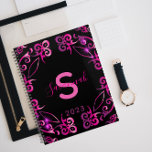 Stylish Glam Elegant Baroque Black And Pink 2023 Planner<br><div class="desc">Modern trendy personalised planner design featuring a pink metallic shiny baroque border on a black background. The text is fully customisable.</div>