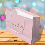 Stylish Gold Monogram Name Script Blush Pink  Large Gift Bag<br><div class="desc">Elegant Modern Blush Pink Delicate Glam Gold Monogram Name Script Signature Custom Personalised Gift Bag. This design featuring your first name in a pretty hand lettered style swash tail font signature typography (or calligraphy) in gold on light blush pink or baby pink colour background. These are easy to customise it....</div>
