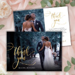 Stylish Gold Script 2 Photo Wedding Thank You Card<br><div class="desc">Modern Elegant Boho Chic Gold Calligraphy Script Wedding 2 Photo Thank You Card. Stylish wedding thank you template featuring a full vertical photo on the front with the text "Thank You" in a whimsical swirly hand lettering typography script swash tail font overlay on the picture and a reverse side one...</div>