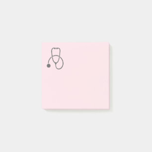 Stylish Grey Stethescope on Pastel Pink Post-it Notes