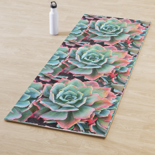 Stylish mint green and pink cactus close-up photo yoga mat
