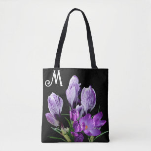 Stylish purple spring crocus flowers on black tote bag