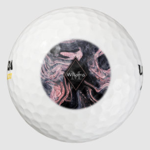 Stylish rose gold abstract marbleised design golf balls