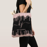 Stylish Rose Gold Glitter Drips Monogram Script Tote Bag<br><div class="desc">Sylish, Girly, Elegant, Light Rose Gold Glitter Drips 2 Monogram Script custom personalised name monogrammed tote bag on black. Featuring a modern luxury faux light pink rose gold glitter dripping frame, a large double hand lettered monogram script font with swashes (large size initials), and a serif type font name in...</div>