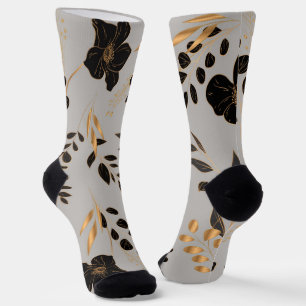 Stylish socks with a black and gold floral design 
