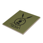 Subdued Maccabee Shield And Spears Tile<br><div class="desc">A black military "subdued" style depiction of a Maccabee's shield and two spears. The shield is adorned by a lion and text reading "Yisrael" (Israel) in the Paleo-Hebrew alphabet. Hebrew text reading "Maccabee" also appears. The Maccabees were Jewish rebels who freed Judea from the yoke of the Seleucid Empire. Chanukkah...</div>