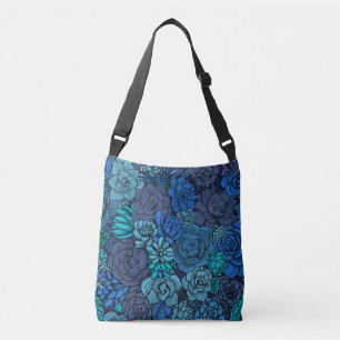 Succulent garden in blue crossbody bag