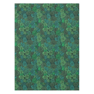 Succulent garden in green tablecloth