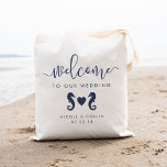 Summer Seahorse Wedding Welcome Bag<br><div class="desc">Welcome guests to your summer wedding or destination wedding with these cute and modern personalised tote bags. Summery, coastal design features "welcome to our wedding" in navy blue modern handwritten calligraphy script, with space to personalise with your names and date. A pair of seahorses joined by a heart completes the...</div>