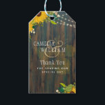 Summer Sunflowers Rustic Wood Wedding Gift Tags<br><div class="desc">This modern wedding item features rustic wood look background with pretty yellow Sunflowers, green leaves and a mix of gold and white modern typography. This design theme is perfect for your farmhouse, woodland, forest, barn, countryside, backyard, garden themed rustic spring, summer wedding.⭐ Design by LeahG®. Congratulations on your engagement. 📌PIN...</div>