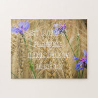 Summer wheat field with blue cornflowers
