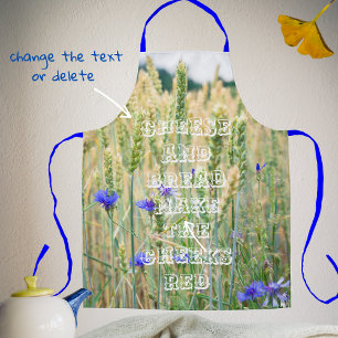 Summer wheat field with cornflowers apron