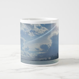 Sun and Clouds Over Water and City Speciality Mug