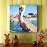 Sun Day Cute Ocean Beach Pier Pelican Bird Photo Canvas Print<br><div class="desc">This happy pelican perched on a railing overlooking a California beach screams “vacation ready”. Imagine the ocean breezes as you gaze at this photo canvas print. You can easily personalise this wall art plus I also offer customisation on any product. IMPORTANT NOTE: Please do not change the size on this...</div>