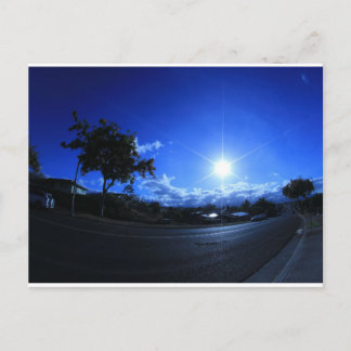 sun in the blue postcard