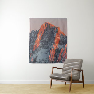 Sun light on snowy mountains tapestry
