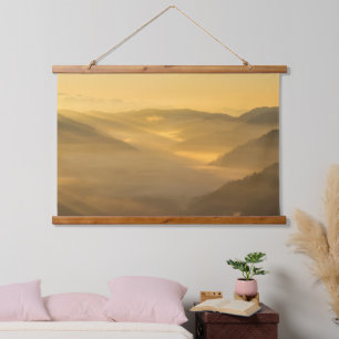 Sun light shining on morning fog hanging tapestry