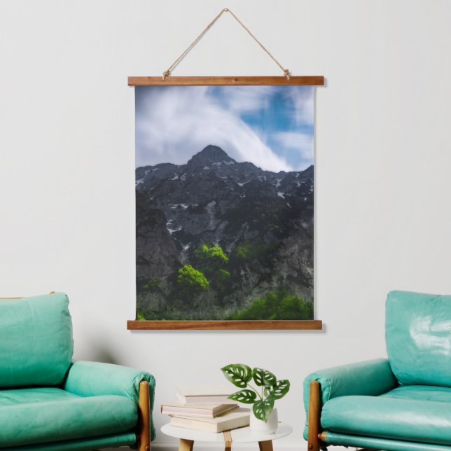 Sun lit green forest beneath the mountains hanging tapestry (Living Room)