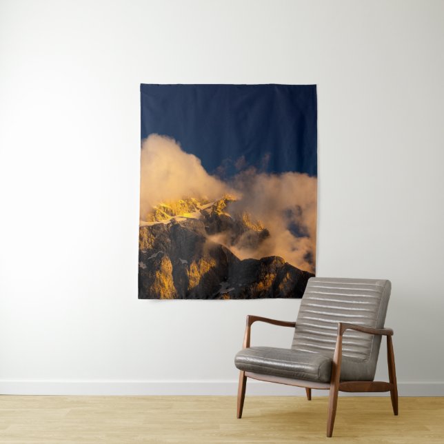Sun lit mountains covered by clouds tapestry (In Situ)
