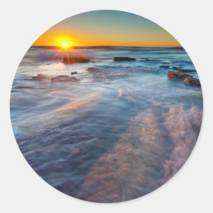 Sun rays illuminate the Pacific Ocean Classic Round Sticker