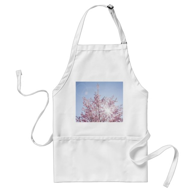 sun rays pass through pink flowers of a wow tree standard apron (Front)