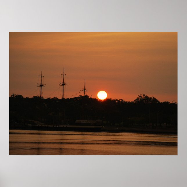 Sun Setting Behind the Pirate Ship Poster.... Poster (Front)