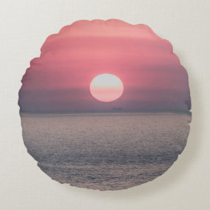 SUN SETTING ON OCEAN HORIZON ROUND CUSHION