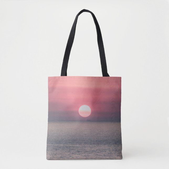 SUN SETTING ON OCEAN HORIZON TOTE BAG (Front)