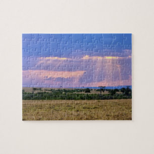 Sun setting on the Masai Mara. Jigsaw Puzzle