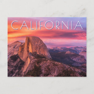 Sun Setting over A Rocky Landscape Postcard